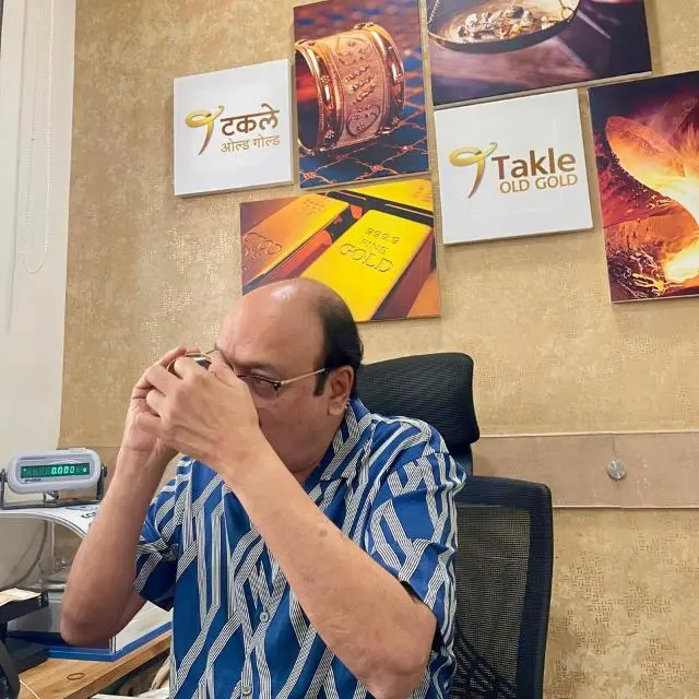 Mr. Pavitra Takle evaluating Gold and Silver Purity at Takle Old Gold Nashik